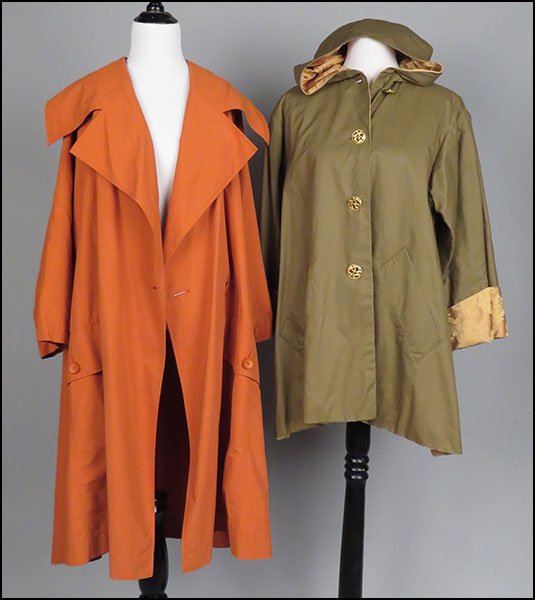 AN ISSEY MIYAKE ORANGE WINDCOAT.: AN ISSEY MIYAKE ORANGE WINDCOAT. Together with an Alice Berry Chicago lined windcoat with a button up front (size unlabeled) Size: Medium