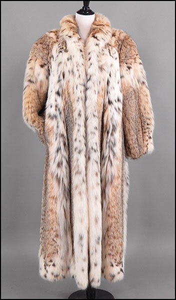 A GALANOS FOR NEIMAN MARCUS FULL-LENGTH LYNX COAT.: A GALANOS FOR NEIMAN MARCUS FULL-LENGTH LYNX COAT. Satin lined. Bearing a hook and eye closure Size unlabeled // Approximately a US 6