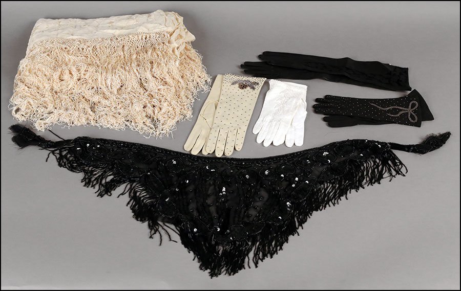 A COLLECTION OF GLOVES.: A COLLECTION OF GLOVES. Together with a beaded clutch and a vintage cream colored shawl