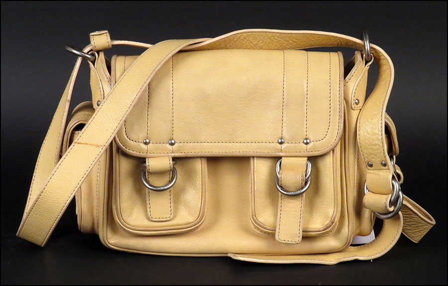 A MARC JACOBS VINTAGE CAMEL LEATHER HANDBAG.: A MARC JACOBS VINTAGE CAMEL LEATHER HANDBAG. With two clasp closure pockets on the front