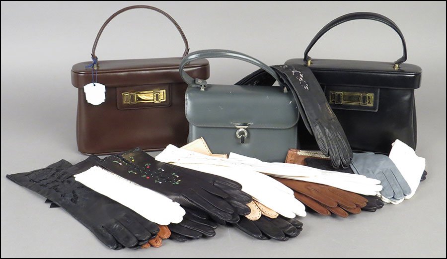 TWO MURRAY KRUGER HANDBAGS.: TWO MURRAY KRUGER HANDBAGS. Both bearing divided interiors and raised on four metal feet. Together with a grey Rosart handbag and over 25 pairs of leather gloves Kruger bags: 11" x 10" x 4"