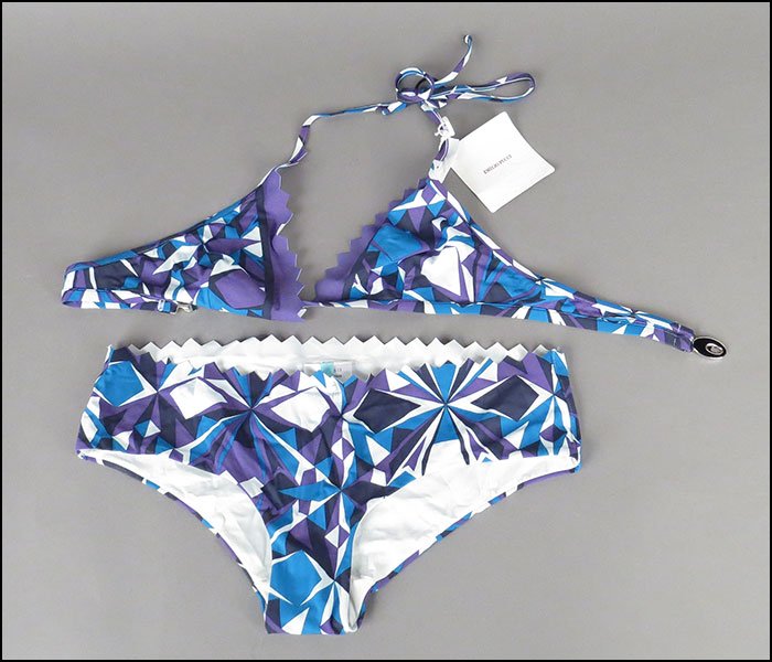 AN EMILIO PUCCI PURPLE, BLACK, AND BLUE PRINT TWO-PIECE: AN EMILIO PUCCI PURPLE, BLACK, AND BLUE PRINT TWO-PIECE BATHING SUIT. With original tags. Never been worn Top: Size 46 Bottom: Size 44