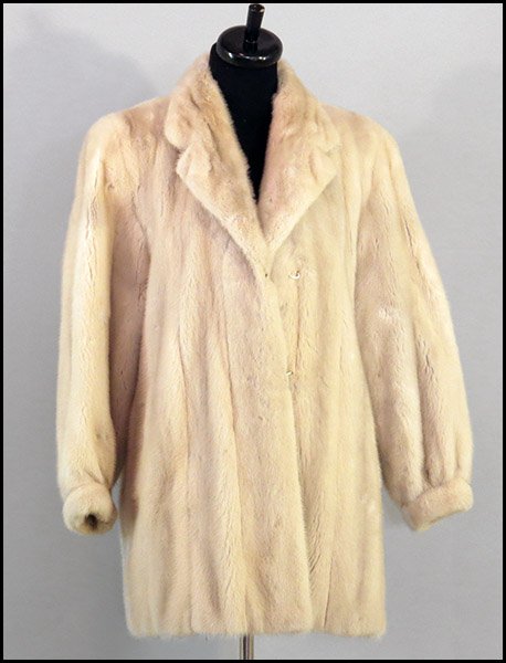 A BLUSH MINK JACKET.: A BLUSH MINK JACKET. With a knotched lapel and satin lining Size: Medium