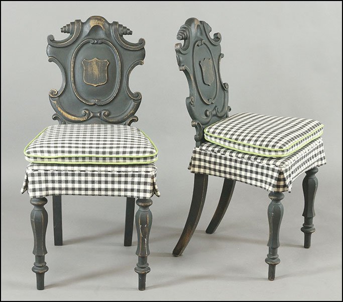 A PAIR OF EBONIZED CARVED WOOD SIDE CHAIRS.: A PAIR OF EBONIZED CARVED WOOD SIDE CHAIRS. Bearing shield form backs. With upholstered seat cushions added Back H: 34.6''