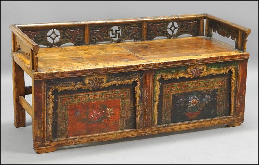 A 19TH CENTURY MONGOLIAN PINE BENCH.: A 19TH CENTURY MONGOLIAN PINE BENCH. Bearing carved and painted panels 28" x 60" x 23"