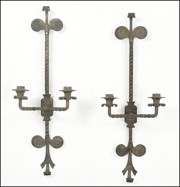A PAIR OF ERWIN GRUEN PATINATED METAL TWO-LIGHT WALL: A PAIR OF ERWIN GRUEN PATINATED METAL TWO-LIGHT WALL SCONCES. Acquired from Mr. Gruen himself 30'' x 11'' x 5''