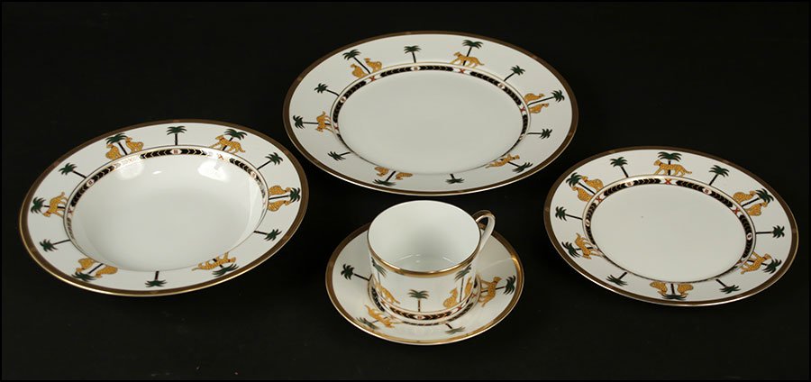 A CHRISTIAN DIOR 'CASABLANCA' PORCELAIN DINNER SERVICE.: A CHRISTIAN DIOR 'CASABLANCA' PORCELAIN DINNER SERVICE. Comprised of twelve dinner plates, twelve soup bowls, twelve teacups, twelve saucers, and twelve bread plates Dinner plate diameter: 10.75''