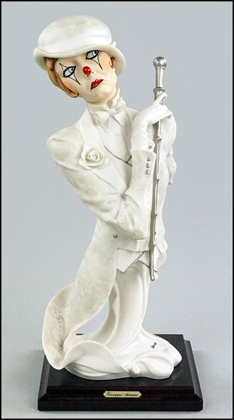 A GIUSEPPE ARMANI 'BITTER SWEET' PORCELAIN FIGURE.: A GIUSEPPE ARMANI 'BITTER SWEET' PORCELAIN FIGURE. Signed on the sculpture. Copyright Florence 1989. Bearing the Capodimonte 'N' crown stamp. Raised on a wood base Figure H: 13''