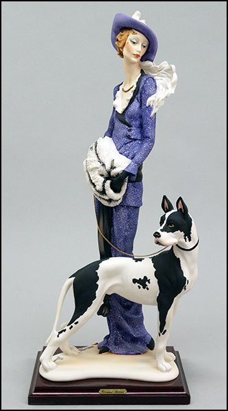 A GIUSEPPE ARMANI 'LADY WITH A GREAT DANE' FIGURE.: A GIUSEPPE ARMANI 'LADY WITH A GREAT DANE' FIGURE. Signed on the sculpture. Copyright Florence 1987. Edition 3269/5000. Bearing the Capodimonte 'N' crown stamp. Raised on a wood base Figure H: 17.75''