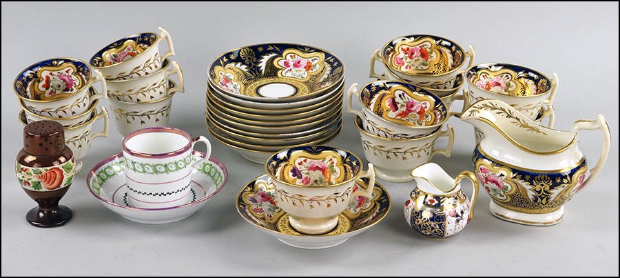 SET OF ELEVEN SPODE TEACUPS AND AND SAUCERS.: SET OF ELEVEN SPODE TEACUPS AND AND SAUCERS. Includes three extra matching teacups. Unmarked. Together with a matching creamer, a minton creamer, a luster decorated demitasse cup, and a luster decorat