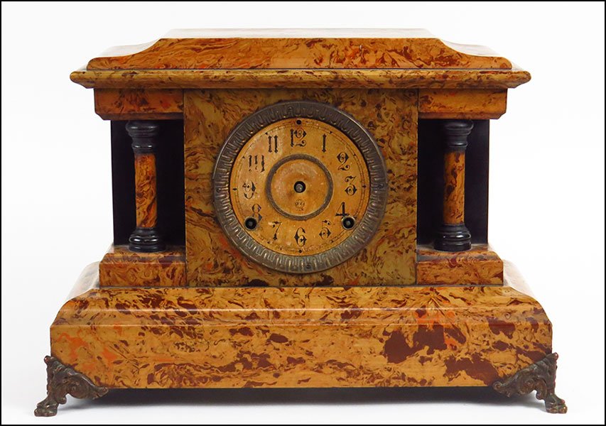 A SETH THOMAS MARBLE VENEER MANTLE CLOCK.: A SETH THOMAS MARBLE VENEER MANTLE CLOCK. Susanin's will not comment on the working condition of any watch or clock movement H: 12" x W: 16" x D: 6"