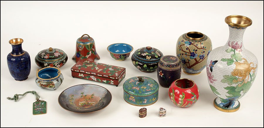 A COLLECTION OF CLOISONNE TABLE ARTICLES.: A COLLECTION OF CLOISONNE TABLE ARTICLES. Comprised of vases, covered boxes, a copper cloisonne bell, a copper cloisonne plate, and other items