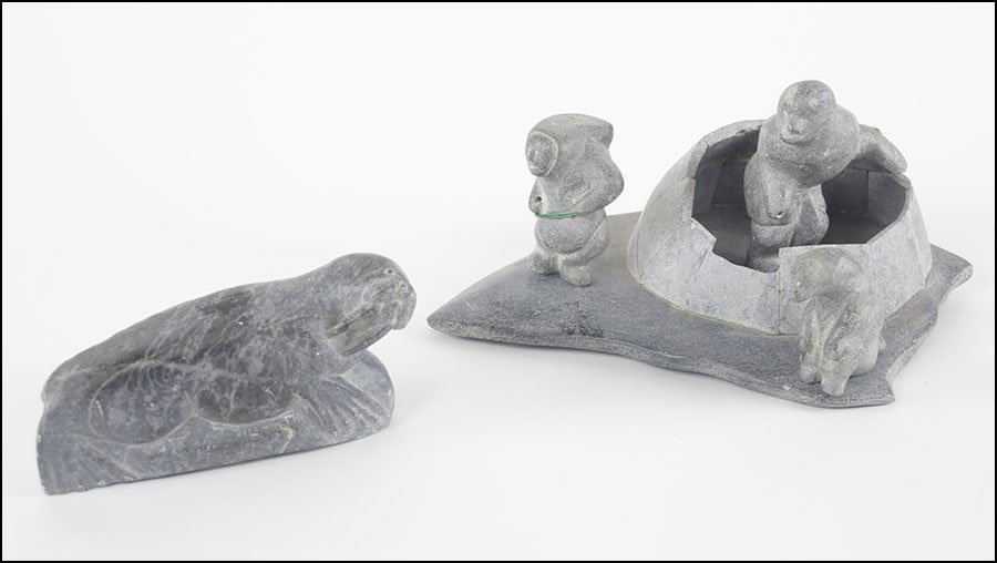 COLLECTION OF INUIT STONE CARVINGS.: COLLECTION OF INUIT STONE CARVINGS. Comprised of a walrus and a figurative group with an igloo Walrus length: 7"