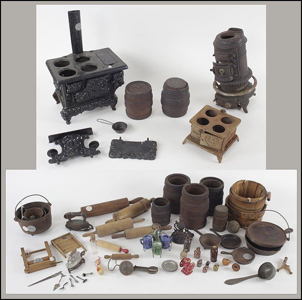 COLLECTION OF DIMINUTIVE DOLL KITCHEN ACCESSORIES.: COLLECTION OF DIMINUTIVE DOLL KITCHEN ACCESSORIES. Comprised of a Kenton cast iron stove, a cast iron wood fire oven, a metal stove, seven barrels, various stoneware jars, wood rolling pins, cast iron
