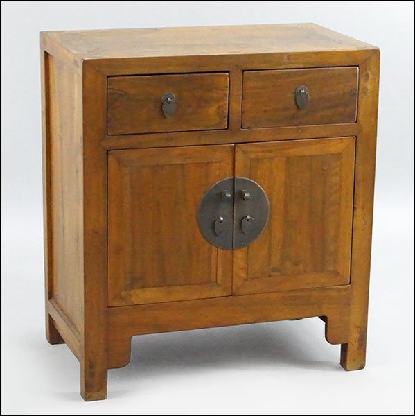 AN EARLY 20TH CENTURY WALNUT BUFFET.: AN EARLY 20TH CENTURY WALNUT BUFFET. Bearing two drawers above and a two-door cupboard below 33" x 29.5" x 17"