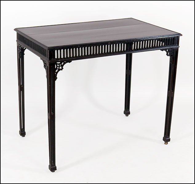 A 19TH CENTURY ENGLISH REGENCY MAHOGANY TEA TABLE.: A 19TH CENTURY ENGLISH REGENCY MAHOGANY TEA TABLE. Bearing a band of open fretwork, raised on casters 28" x 33" x 22"