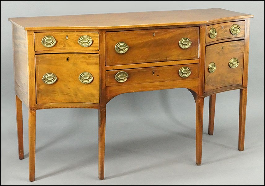 AN 18TH CENTURY WALNUT SIDEBOARD.: AN 18TH CENTURY WALNUT SIDEBOARD. Bearing a fall front secretary which opens to reveal a leather writing surface, drawers, and cubbyholes. Serpentine in form with an inlaid decoration throughout and s