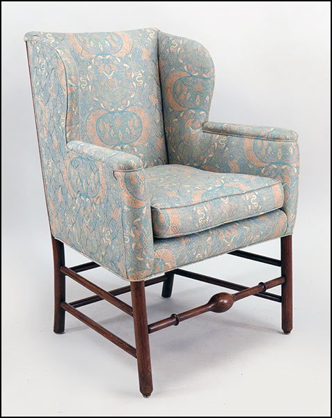 AN OAK UPHOLSTERED LADIES WINGBACK CHAIR.: AN OAK UPHOLSTERED LADIES WINGBACK CHAIR. 40" x 30" x 23"