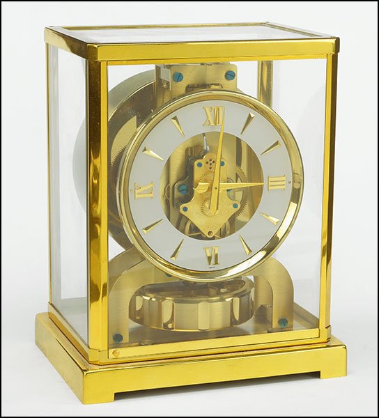 JAEGER LECOULTRE BRASS 'ATMOS' MANTLE CLOCK.: JAEGER LECOULTRE BRASS 'ATMOS' MANTLE CLOCK. Stamped en verso. With 'Swiss' on the face 9'' x 6.5'' x 4.75''