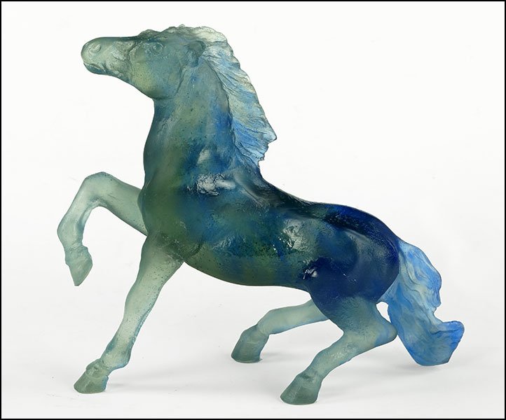 A DAUM PATE DE VERRE GLASS HORSE.: A DAUM PATE DE VERRE GLASS HORSE. Signed along the torso Height: 6.5" x D: 7.5"