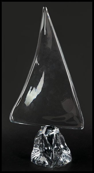 A DAUM GLASS SAILBOAT SCULPTURE.: A DAUM GLASS SAILBOAT SCULPTURE. Titled "The Sail". Signed below Height: 20"