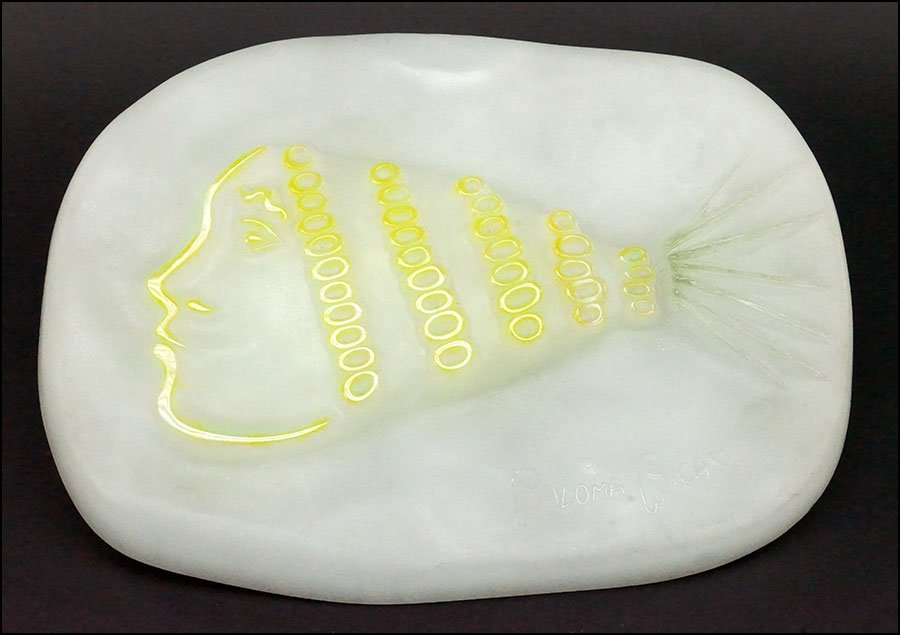 A PALOMA PICASSO FOR DAUM PATE-DE-VERRE PLAQUE.: A PALOMA PICASSO FOR DAUM PATE-DE-VERRE PLAQUE. Entitled 'Pineapple Girl.' With raised lettering reading 'Made in France' LL and 'Paloma Picasso, Daum' LR. Etched edition number 125/150 LR H: 13" W: 1