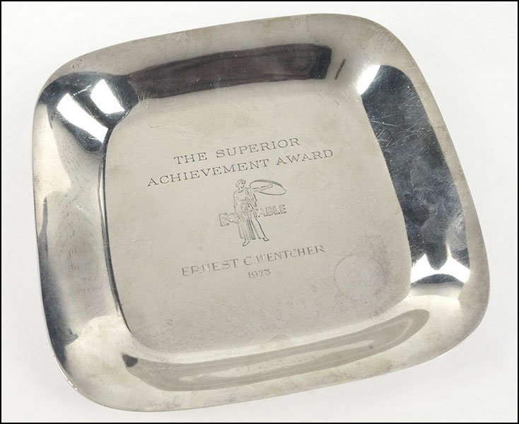 A TIFFANY & CO. STERLING SILVER DISH.: A TIFFANY & CO. STERLING SILVER DISH. Stamped 'Tiffany & Co. Makers, Sterling Silver, 23729' on underside of lip. Front of dish engraved 'The Superior Achievement Award, Equitable, Ernest C. Wentcher