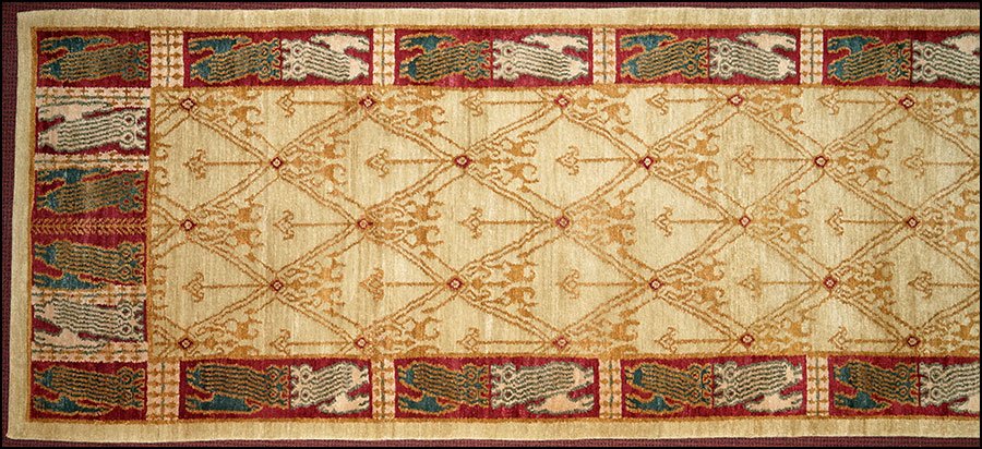 A MICHAELIAN & KOHLBERG NEPALESE RUNNER.: A MICHAELIAN & KOHLBERG NEPALESE RUNNER. 100% hand woven Himalayan wool. Bearing maker's label and a 'Ranta' label 12'1" x 3'3"