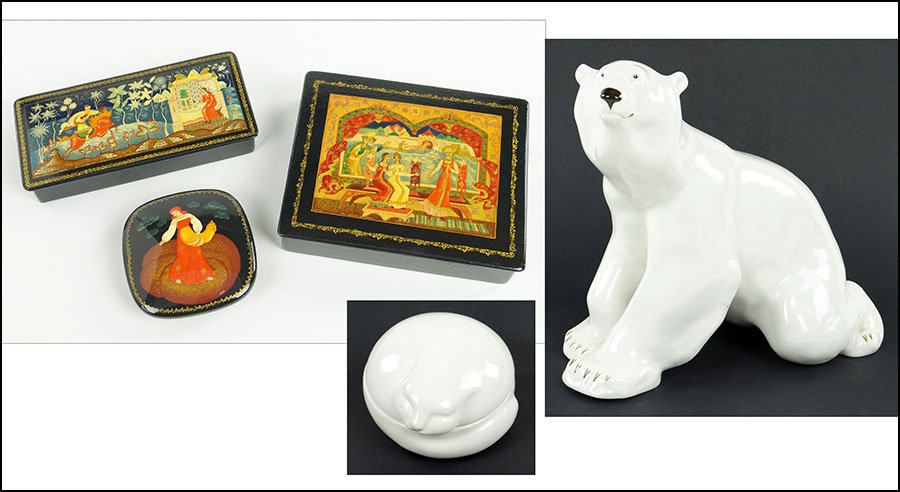 TWO RUSSIAN LACQUERED BOXES.: TWO RUSSIAN LACQUERED BOXES. Together with a Lomonosov porcelain bear, a Russian enamel metal box, and a Tiffany & Co cat form ceramic box Bear height: 10.5"