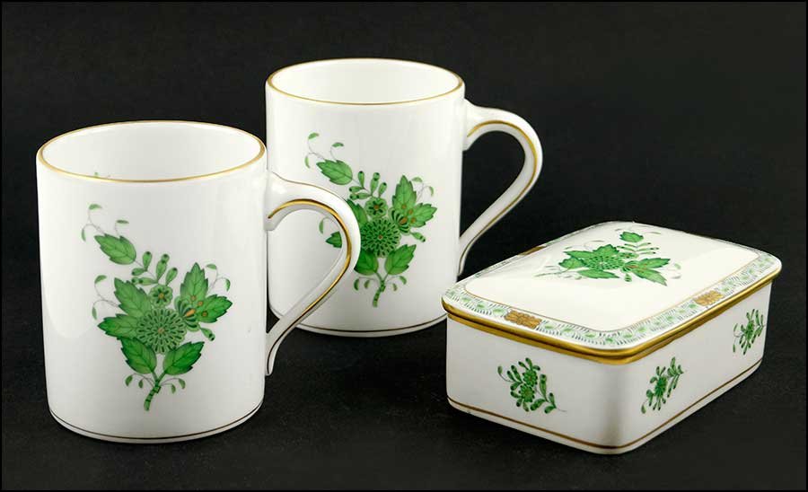 TWO HEREND HUNGARY HAND PAINTED COFFEE MUGS.: TWO HEREND HUNGARY HAND PAINTED COFFEE MUGS. In the green Chinese Bouquet pattern and stamped 'Herend Hungary Hand Painted 294/AV' on both. Together with a Herend square covered dish in the green Chin