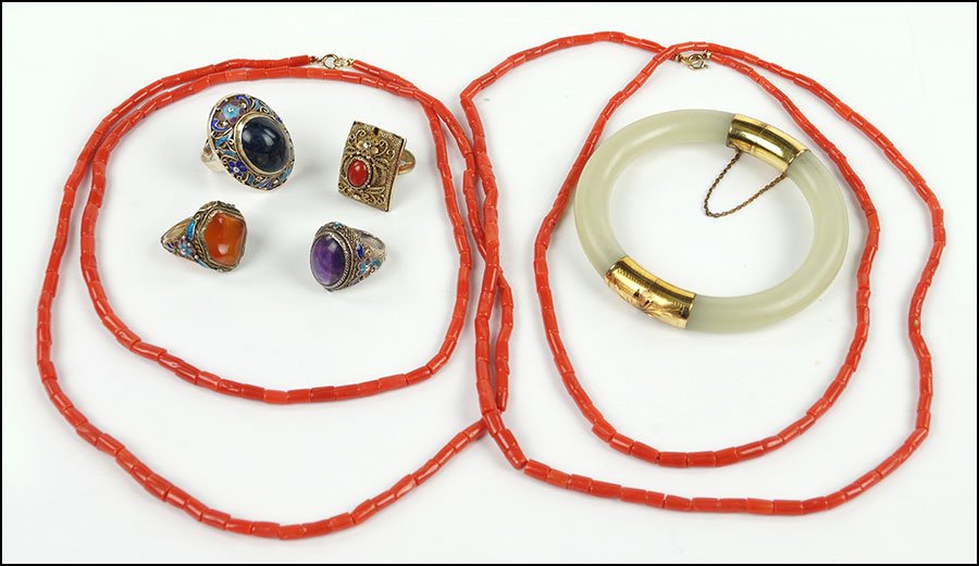 TWO CORAL BEAD NECKLACES.: TWO CORAL BEAD NECKLACES. Together with a Chinese enamel and carnelian ring, a Chinese enamel and amethyst ring, a Chinese enamel and stone ring, a Chinese coral and gilt silver ring, and a Chinese qu