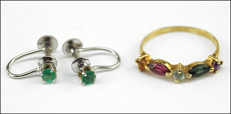 A PAIR OF EMERALD AND 14 KARAT WHITE GOLD EARRINGS.: A PAIR OF EMERALD AND 14 KARAT WHITE GOLD EARRINGS. Each screwback earring contains one prong set round emerald. Together with a semi-precious stone and 18 karat yellow gold ring Ring Size: 7
