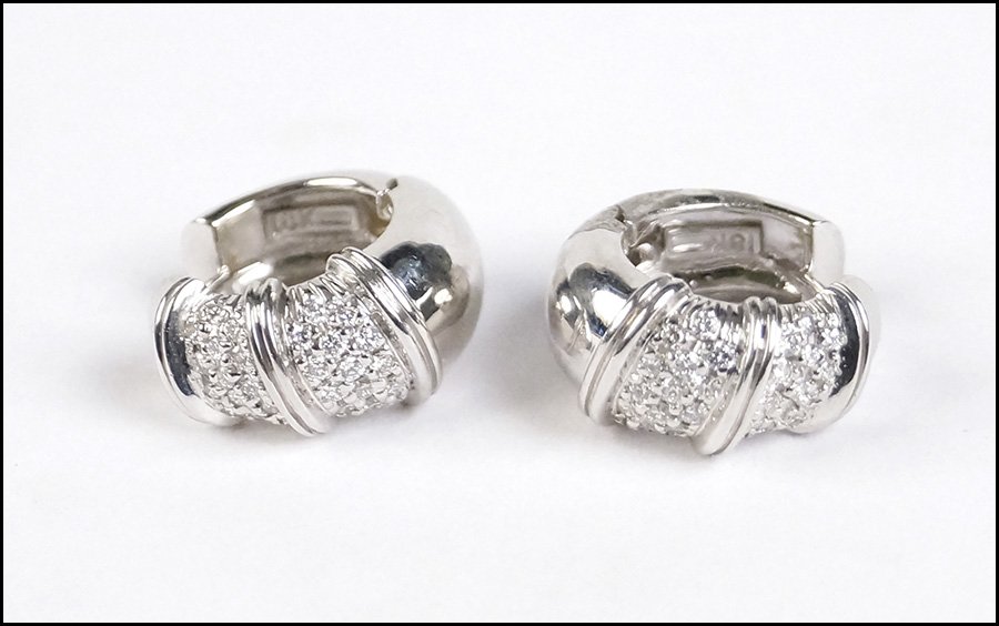 A PAIR OF ROBERTO COIN DIAMOND AND 18 KARAT WHITE GOLD: A PAIR OF ROBERTO COIN DIAMOND AND 18 KARAT WHITE GOLD 'NABUCCO' EARRINGS. Comprised of 52 round diamonds which are G color, VS clarity, and total approximately .48 carat Wt: 11.1 grams
