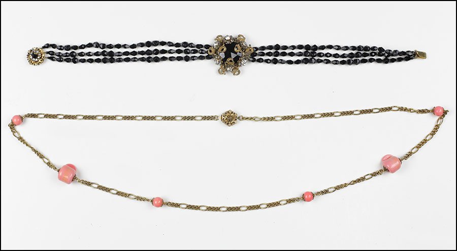 TWO MIRIAM HASKELL NECKLACES.: TWO MIRIAM HASKELL NECKLACES. Comprising one goldtone and faux coral bead necklace and one goldtone and black bead necklace Necklace: 36"