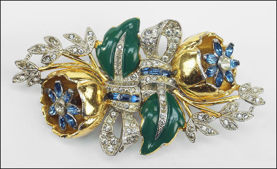 A CORO DUETTE TREMBLER BROOCH.: A CORO DUETTE TREMBLER BROOCH. To be worn as a brooch and deconstructs for use as a pair of dress clips. Piece is unsigned Width: 3.5"