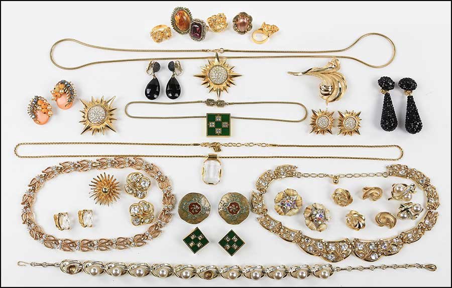 A GIVENCHY GREEN ENAMEL AND RHINESTONE DEMI-PARURE.: A GIVENCHY GREEN ENAMEL AND RHINESTONE DEMI-PARURE. Containing a necklace and ear clips, each containing four white rhinestones. Together with a collection of signed and unsigned goldtone jewelry incl