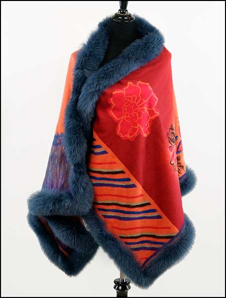 AN ETRO CASHMERE AND WOOL BLEND FLORAL PRINT SHAWL.: AN ETRO CASHMERE AND WOOL BLEND FLORAL PRINT SHAWL. Bearing a blue colored fur trim