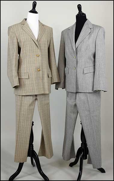 A LADY'S HUGO BOSS WOOL PANT SUIT.: A LADY'S HUGO BOSS WOOL PANT SUIT. Containing a jacket (size 14) and pair of trousers (size 12). Together with a Richard Tyler gray wool pant suit containing a jacket (size 14) and pair of trousers (s