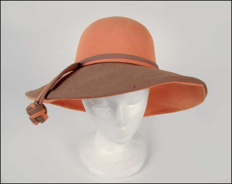 AN YVES SAINT LAURENT PINK AND LAVENDER WOOL HAT.: AN YVES SAINT LAURENT PINK AND LAVENDER WOOL HAT. Interior bears a white label reading "Yves Saint Laurent Paris - New York"