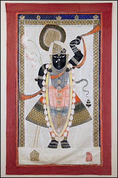 AN INDIAN PECHOIR DEPICTING KRISHNA.: AN INDIAN PECHOIR DEPICTING KRISHNA. Mounted within an acrylic shadow box Pechoir: 65" x 41" Frame: 74" x 48"