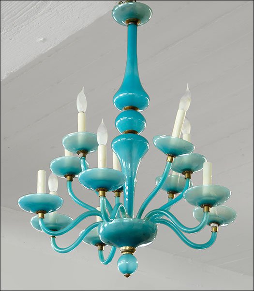 A Blue Opaline Glass Twelve Light Chandelier.: A Blue Opaline Glass Twelve Light Chandelier. 30" x 21"