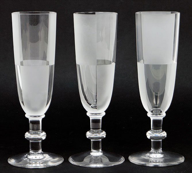 Three Hermes Crystal Champagne Flutes.