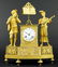 A 19th Century French Empire Gilt Bronze Clock.