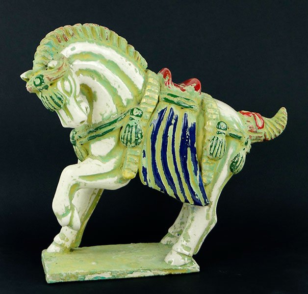 A Contemporary Tang Style Painted Pottery Horse.: A Contemporary Tang Style Painted Pottery Horse. With red and cobalt blue saddle 12.75" x 14.5"