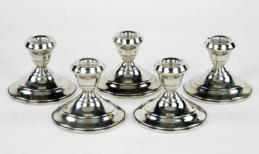 A Set Of Five Sterling Silver Weighted Candlesticks. (1 of 1)