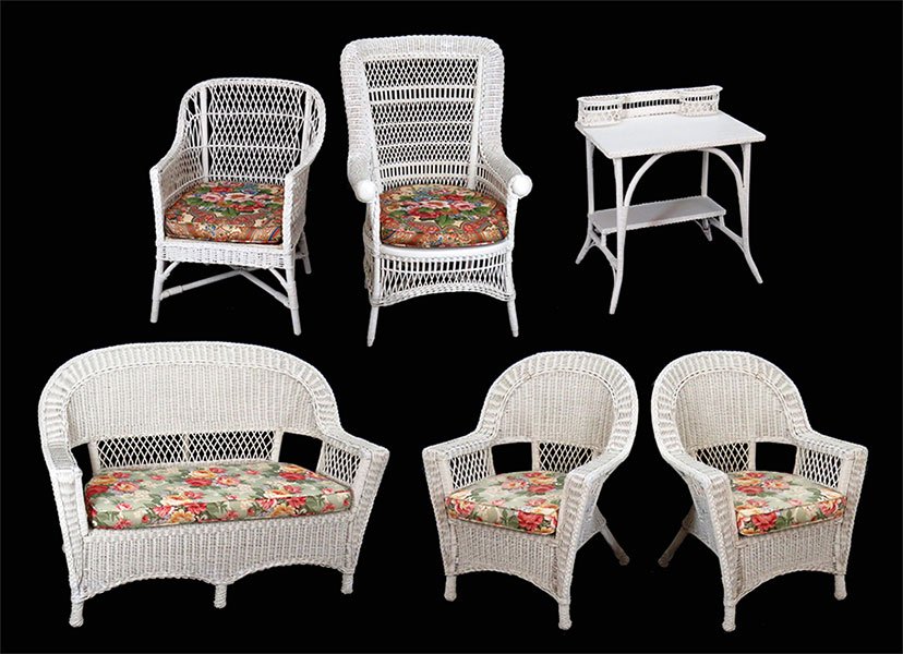 A Pair of White Wicker Armchairs.: A Pair of White Wicker Armchairs. Together with a wicker sofa (38" x 53" x 24"), two chairs, and a vanity Tallest chair height: 41"