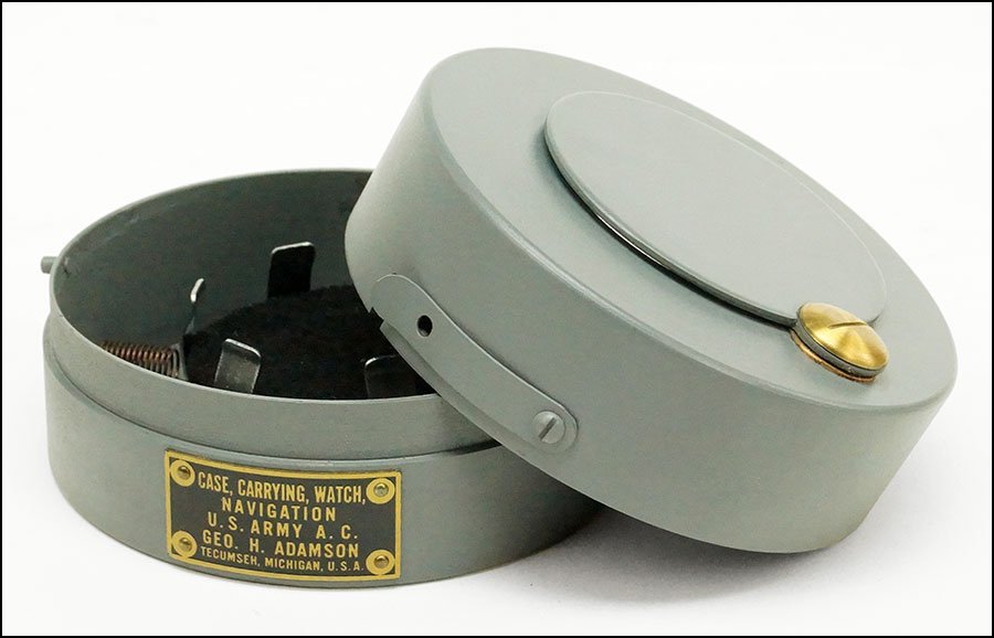 A United States Army Issue Watch Carrying Case.: A United States Army Issue Watch Carrying Case. Geo. H. Adamson Tecumseit, Michigan. Case does not contain watch. With original box 2" x 4"
