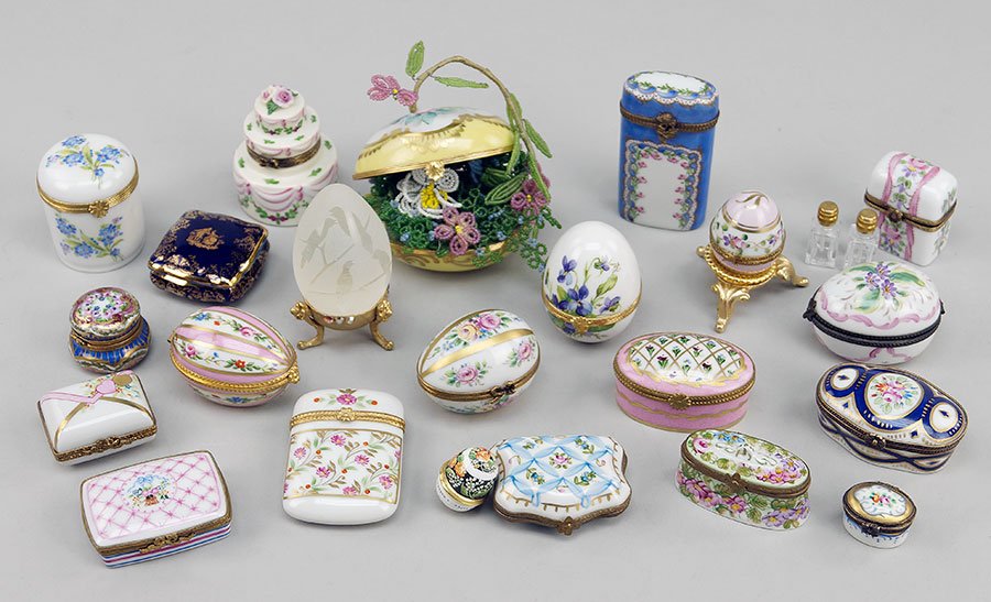 A Collection Of Limoges Porcelain And Enamel Boxes.: A Collection Of Limoges Porcelain And Enamel Boxes. Comprising over fifteen boxes. Together with frosted and clear glass egg-form paperweight depicting birds Tallest Box: 3.5"