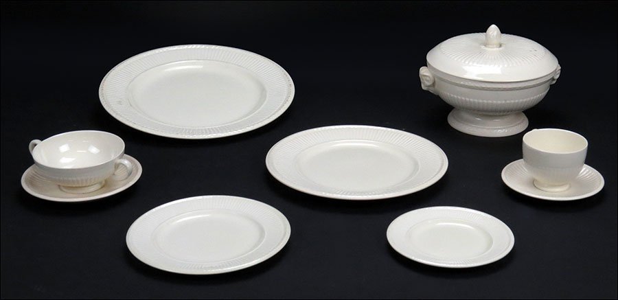A Wedgwood Dinner Service.: A Wedgwood Dinner Service. In the Edme pattern. Comprising ten dinner plates, eleven salad plates, five bread plates, eight bouillon cups and saucers, seventeen teacups and saucers, one round platter,