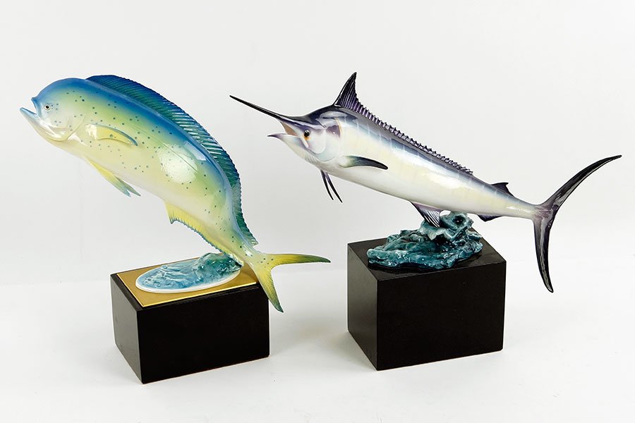 Two Royal Worcester Porcelain Fish After Ronald Van: Two Royal Worcester Porcelain Fish After Ronald Van Ruyckevelt. Blue Marlin, number 303, dated 1965 and Dolphin, number 212, dated 1967. Both sit in black bases Marlin with base: 11" x 14"